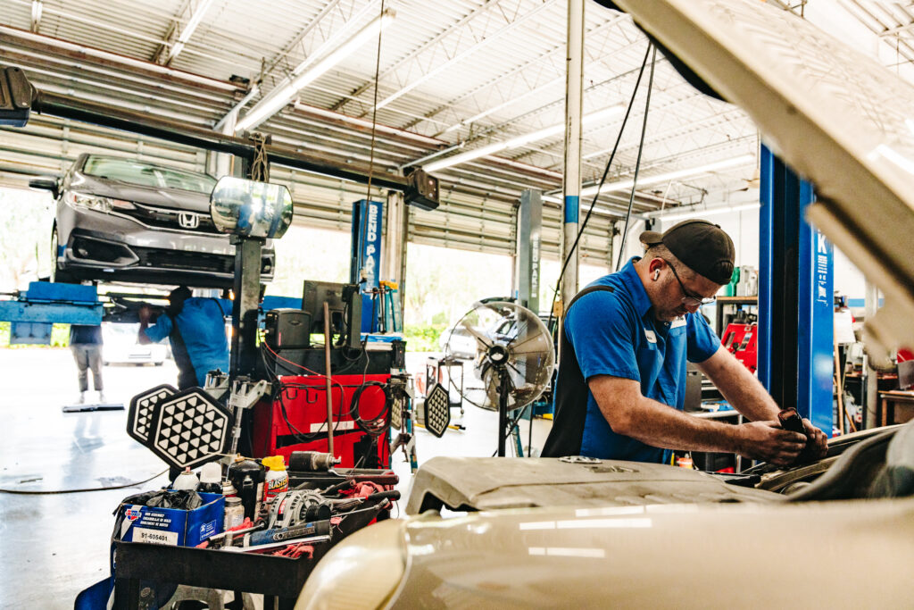 Goodturn technician working on a car